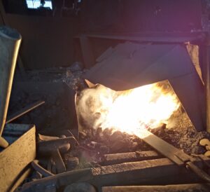 piece of steel heated in coal forge